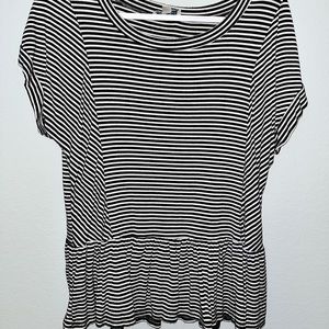 Staple yet basic black and white striped tshirt.
